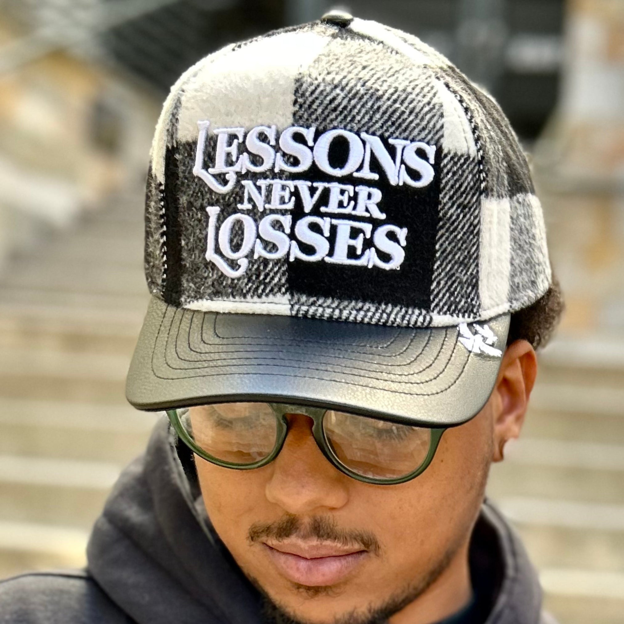 Lessons Never Losses Cap