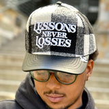 Lessons Never Losses Cap